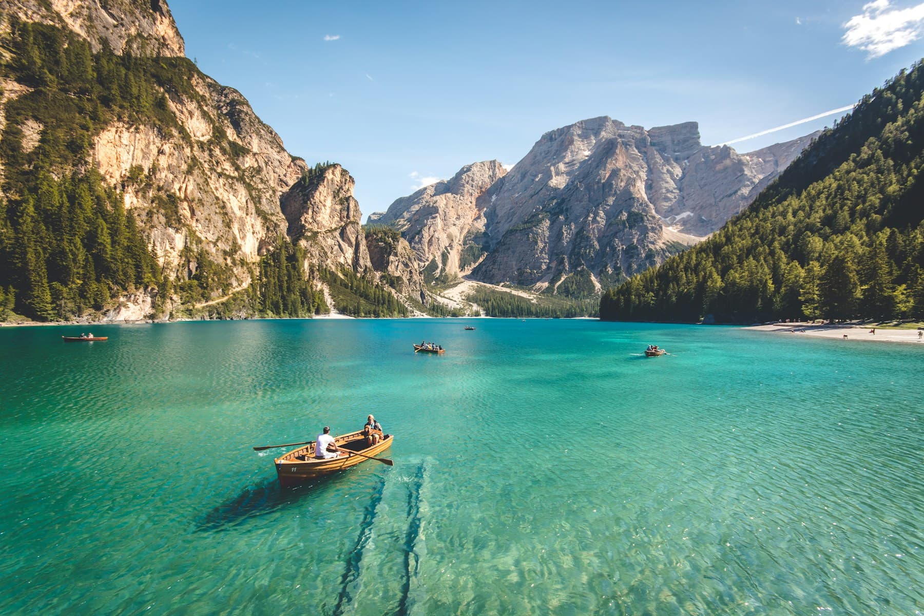 Clear alpine lake and mountain scenery for chalet and mountain day planning