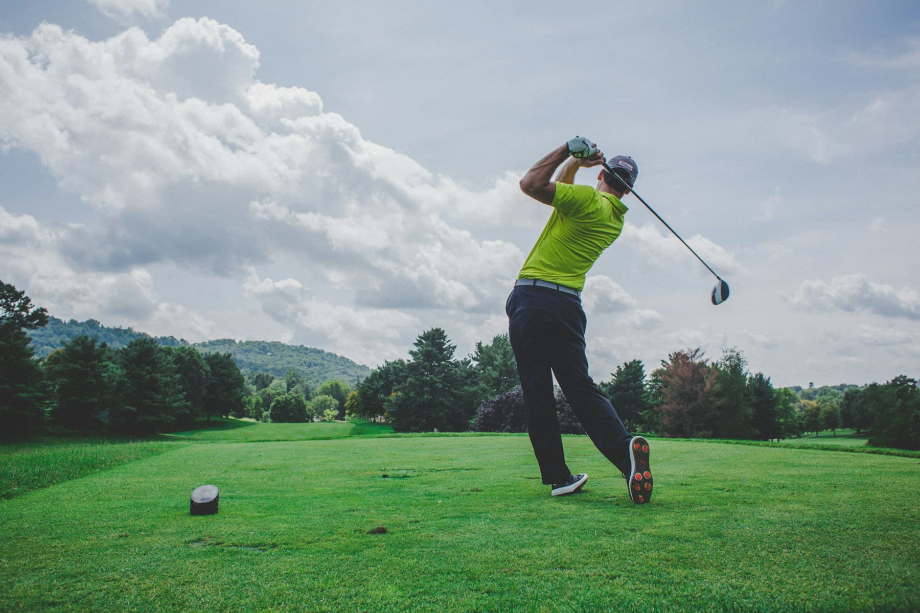 Golfer playing on a green course for private sport and club planning